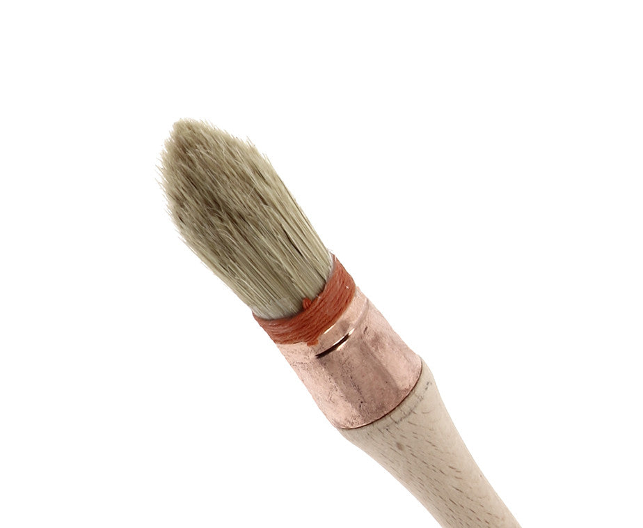 Bristle/synthetic thumb brush with collar