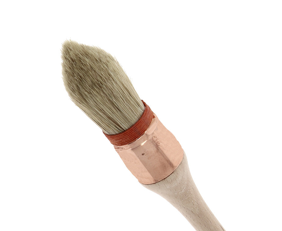 Bristle/synthetic thumb brush with collar