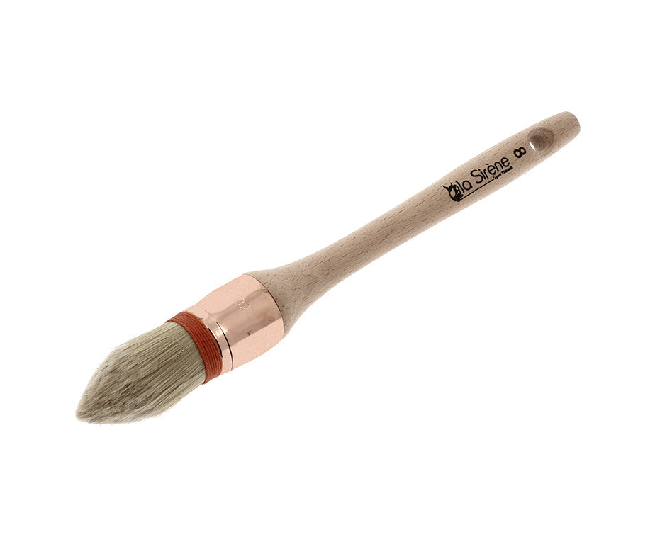 Bristle/synthetic thumb brush with collar