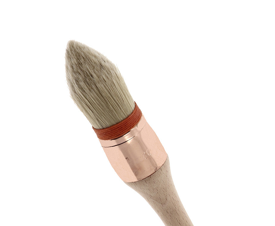 Bristle/synthetic thumb brush with collar