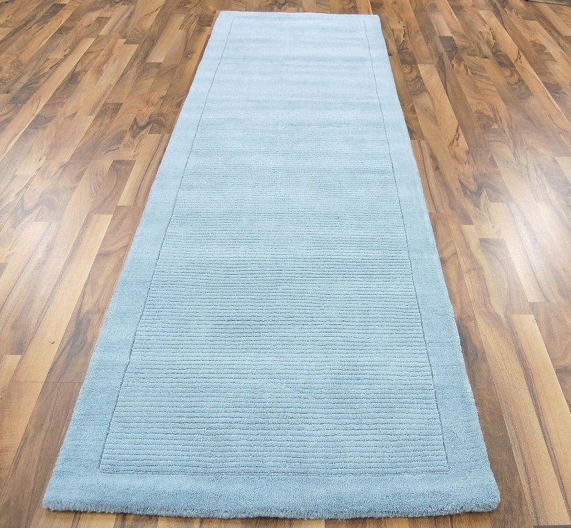 Tapis de couloir uni pure laine CANDY Bleu ciel - Novatrend 